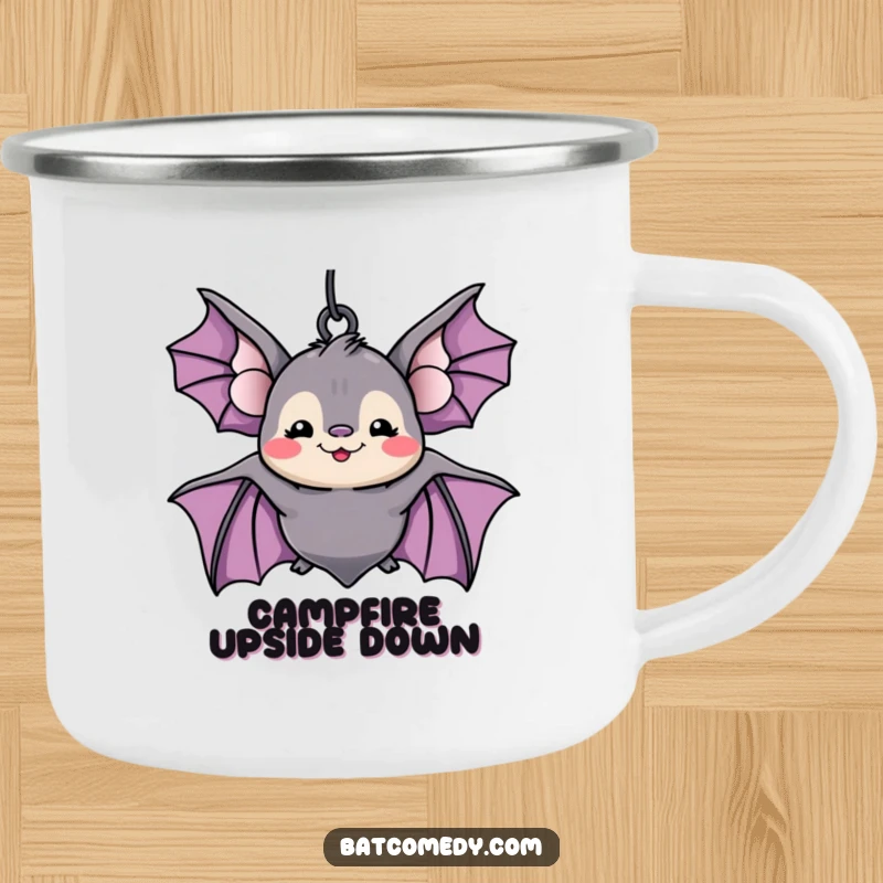 Funny kawaii bat with a silly grin hanging upside down on a camping mug, designed for humorous outdoor enjoyment.