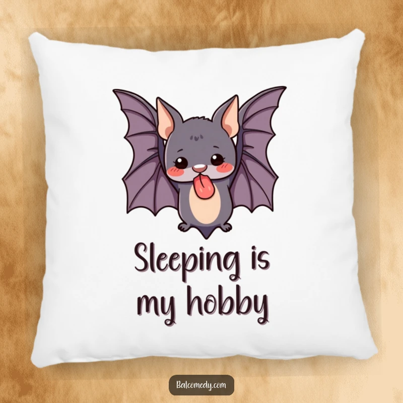 Funny pillow featuring a cute bat hanging upside down with its tongue sticking out, offering comfort and a dose of playful humor.