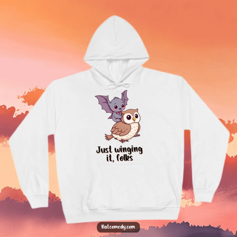 Funny hoodie depicting a happy bat giggling atop a gentle owl, offering warmth and humor as a great gift.