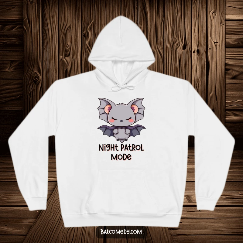 Funny hoodie depicting a black bat in a tiny red cape with a sly, mischievous smirk, ready for a night out.