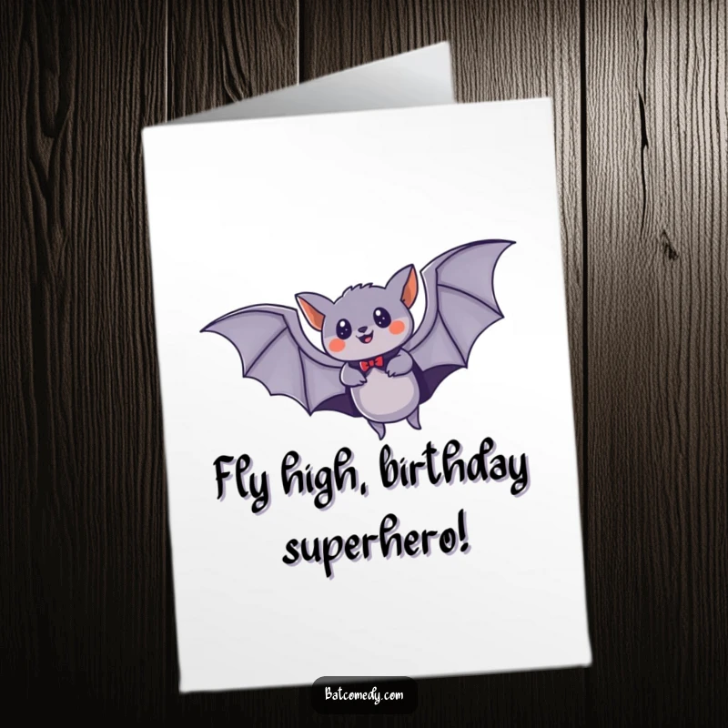 Funny Free Printable Birthday Card featuring a bat in a tiny cape, soaring through the night sky with superhero speed.