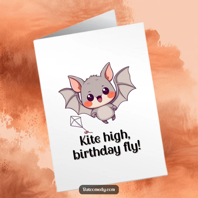Funny Free Printable Birthday Card: An excited bat with wide eyes struggles to fly a tiny kite.