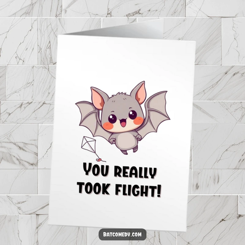 Funny Free Printable Congratulations Card: An excited bat joyfully attempts to fly a miniature kite.