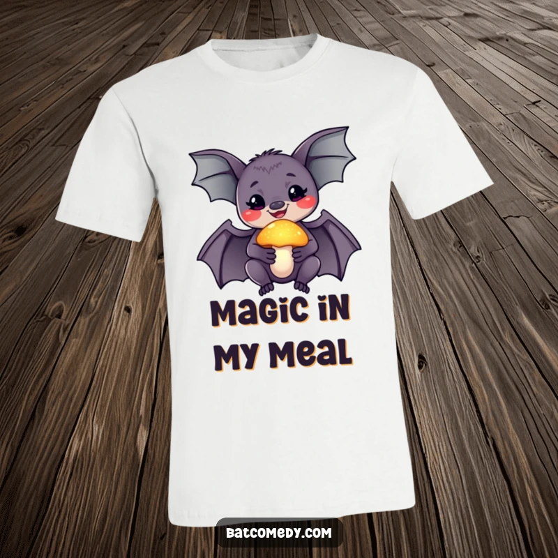 Funny t-shirt depicting a smiling bat holding a brightly glowing mushroom, with an expression of pure awe and wonderment.